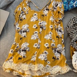 Nice yellow shirt with flower pattern